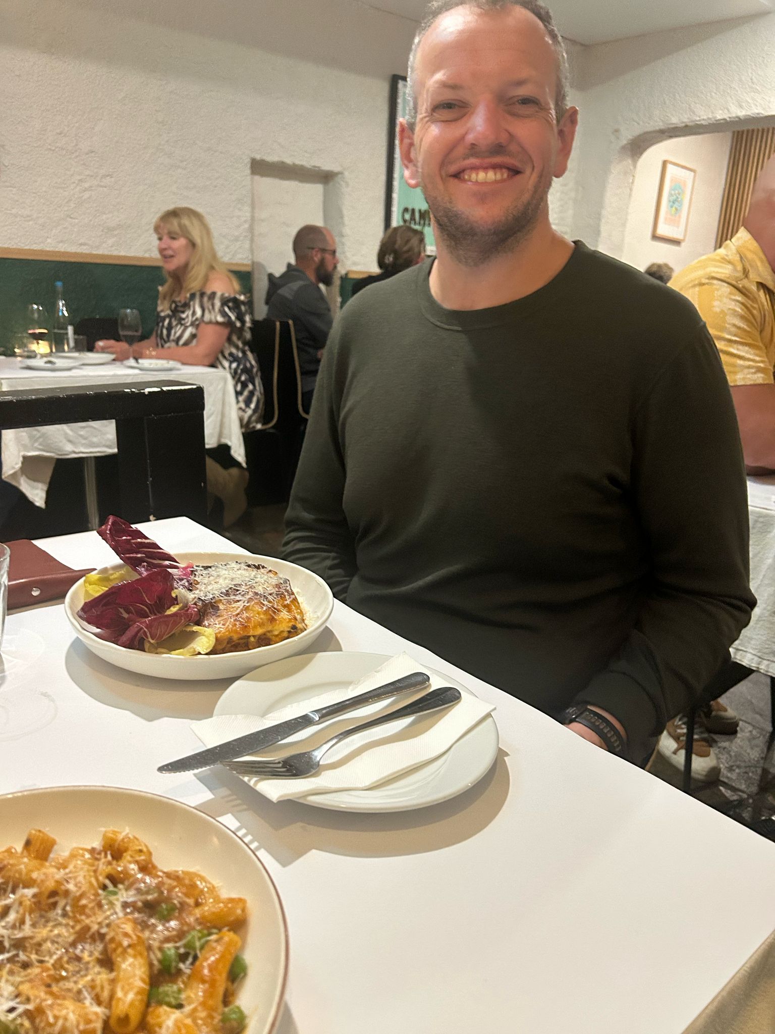 Plate of lasagne on a table at Bar Monti
